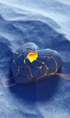 a-rock-with-a-hole-in-the-middle-of-it.jpg a rock with a hole in the middle of it
